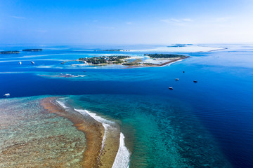Fototapeta na wymiar Aerial view, Maldives island Kandooma and Guraidhoo lagoon, South Male Atoll, Maldives