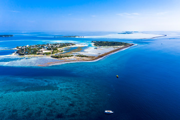 Aerial view, Maldives island Kandooma and Guraidhoo lagoon, South Male Atoll, Maldives