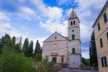 Fototapeta na wymiar Zlarin, Croatia / 18th May 2019: Church of Holy Mary in Zlarin Island near Sibenik
