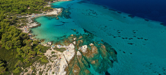 Aerial drone ultra wide photo of tropical exotic bay with emerald crystal clear sea