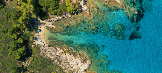 Aerial drone ultra wide photo of beautiful exotic paradise rocky turquoise beach in Caribbean...
