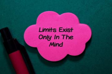 Limit Exist Only in The Mind write on stick note isolated on Office Desk