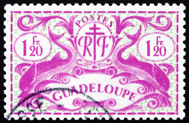 Postage stamp Guadeloupe 1945 Dolphins