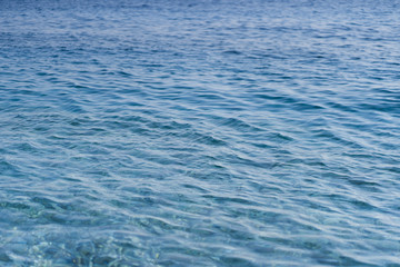 Caribbean sea surface summer wave background. Exotic water landscape with clouds on horizon. Natural tropical water paradise. Cuba nature relax. Travel tropical island resort. Ocean nature tranquility