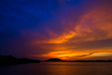 sunset island in the lake with  colorful sky