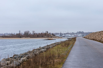 Fototapeta premium Gloomy late autumn morning at New Bedford hurricane barrier
