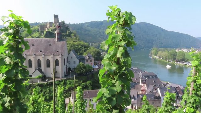 Carmine Church of Beilstein at Moselle River in Germany. Vineyard landscape.