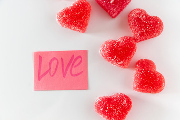Fototapeta na wymiar Sticker with the word love and marmalade