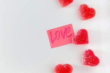 Obraz na płótnie Canvas Sticker with the word love and marmalade