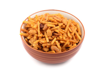 Deep fried salty dish - chivda or mixture made of gram flour and mixed with dry fruits.