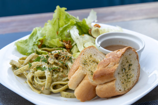 Oil Base Spaghetti With Garlic Bread And Salad