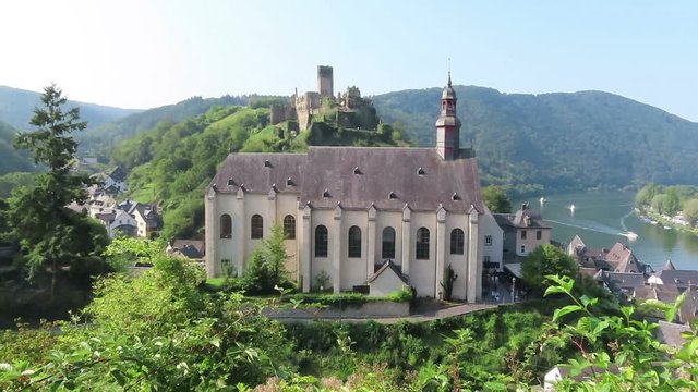 Carmine Church of Beilstein at Moselle River in Germany. Vineyard landscape.