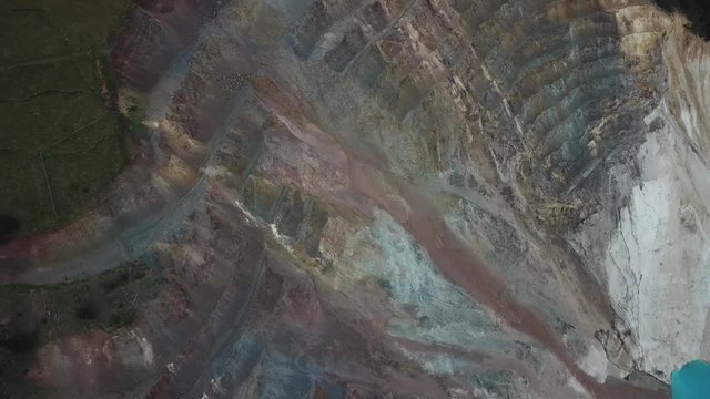 Drone Aerial View on Hole in Alta Mountain With Aqua Blue Water. Abandoned Lead Zinc and Silver Mine in Montana USA Near City of Corbin