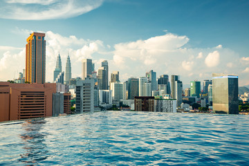 Kuala Lumpur skyline pool view	