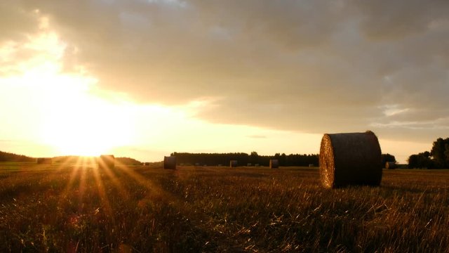 Hay bales in the sunset