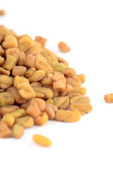 Fenugreek seeds isolated on white background