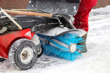 special machine for snow removal cleans the road