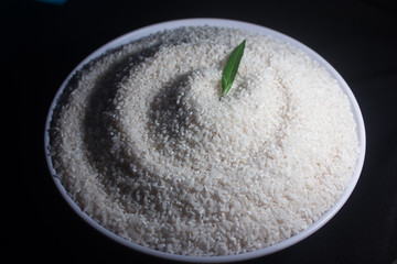 healthy food of the white rice isolated on dark background