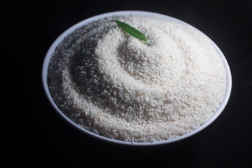 healthy food of the white rice isolated on dark background