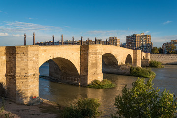 Puente de Piedra or bridge of lions across the river Ebro in the Spanish city Zaragoza