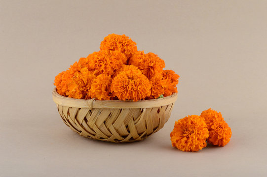 Marigold (Zendu Flowers) flowers in a bamboo basket.