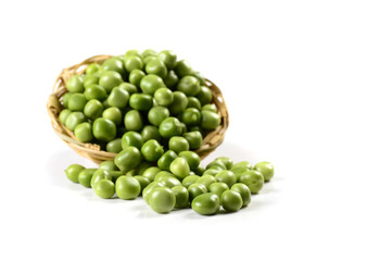 Fresh Green Peas in basket on white background