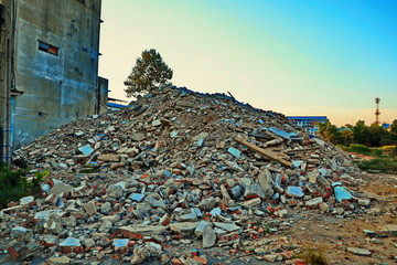 broken concrete slabs demolition waste on landfill.