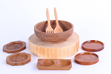 different kitchen wooden utensils on white background