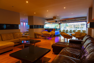 interior of modern bar and restaurant, with pink environment