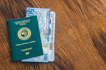 Nigerian Passport with Saudi Riyal Banknotes