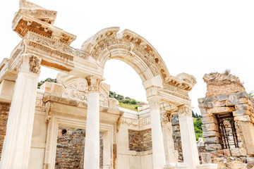 Antique ruins in a medieval city against the blue sky.