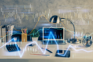 Double exposure of forex graph and work space with computer. Concept of international online trading.