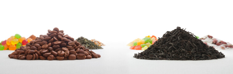 Heaps of coffee and tea on a background of thematically similar heaps
