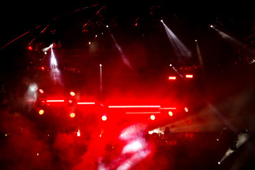 Red light on a rock concert stage as background