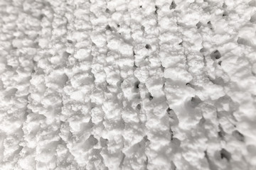 White walls of ice and snow in a cave