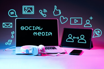 Laptip and touch pad with social media icons.