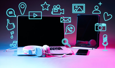 Laptip and touch pad with social media icons.