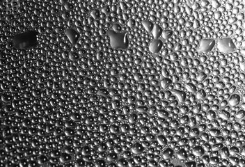 Drops of water on glass as a background
