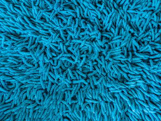 Doormat background & texture. Blue doormat background. close-up blue cleaning doormat or carpet texture.