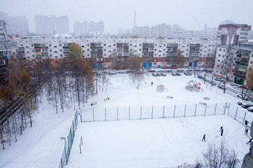 Surgut in winter. City view. Typical Soviet buildings. Polar day.