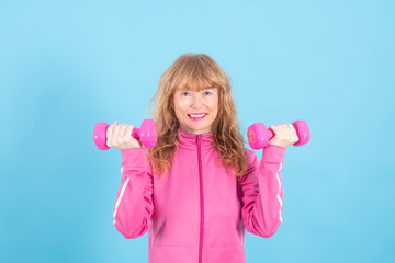 adult woman with sportswear doing weights or exercises isolated on background