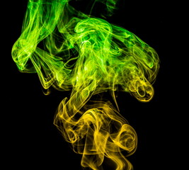 Colored smoke on black background