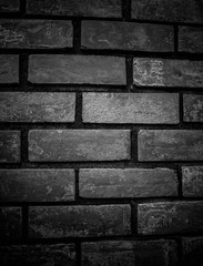 black stone blocks background. Stones texture. The wall of stones.black block and aged. black abstract background.