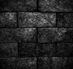 black stone blocks background. Stones texture. The wall of stones.black block and rustic.