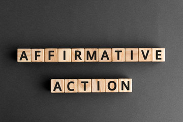 affirmative action- phrase words from wooden blocks with letters, affirmative action  support...