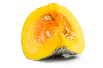 Asian pumpkin species cut in half on a white background with clipping path.