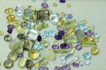 Several colour and kind of gems stone om white background