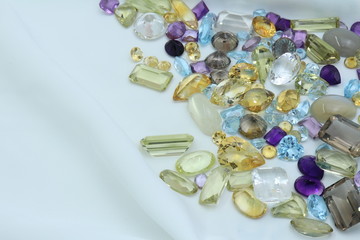 Several colour and kind of gems stone om white background