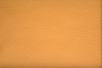 Genuine leather beige. Background. Texture. Close up shot.
