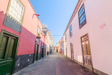 Fototapeta na wymiar Picturesque And Colorful Houses In The City Of La Laguna. April 13, 2019. La Laguna, Santa Cruz De Tenerife Spain Africa. Travel Tourism Street Photography.